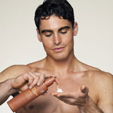 Man applying Feel Confident Thickening Conditioner — sulfate-free conditioner for fuller-looking hair