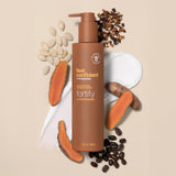Feel Confident Thickening Conditioner bottle surrounded by coffee beans, pumpkin seed oil, saw palmetto and turmeric ingredients
