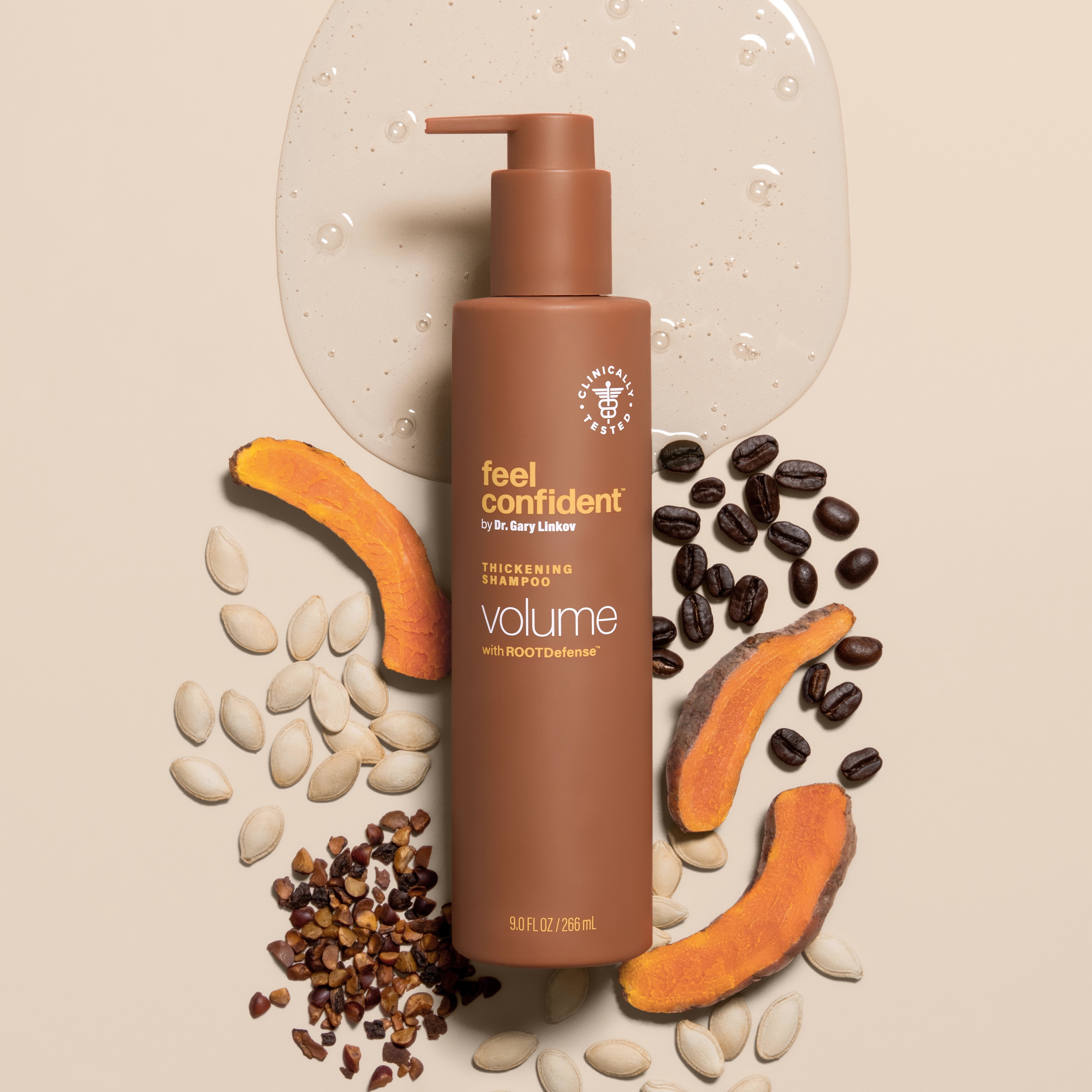 Feel Confident Thickening Shampoo for Fuller-Looking Hair - surrounded by coffee beans, pumpkin seed oil, saw palmetto and turmeric ingredients.