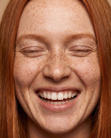 Woman with thinning hair considering Feel Confident doctor-guided prescription hair loss treatment